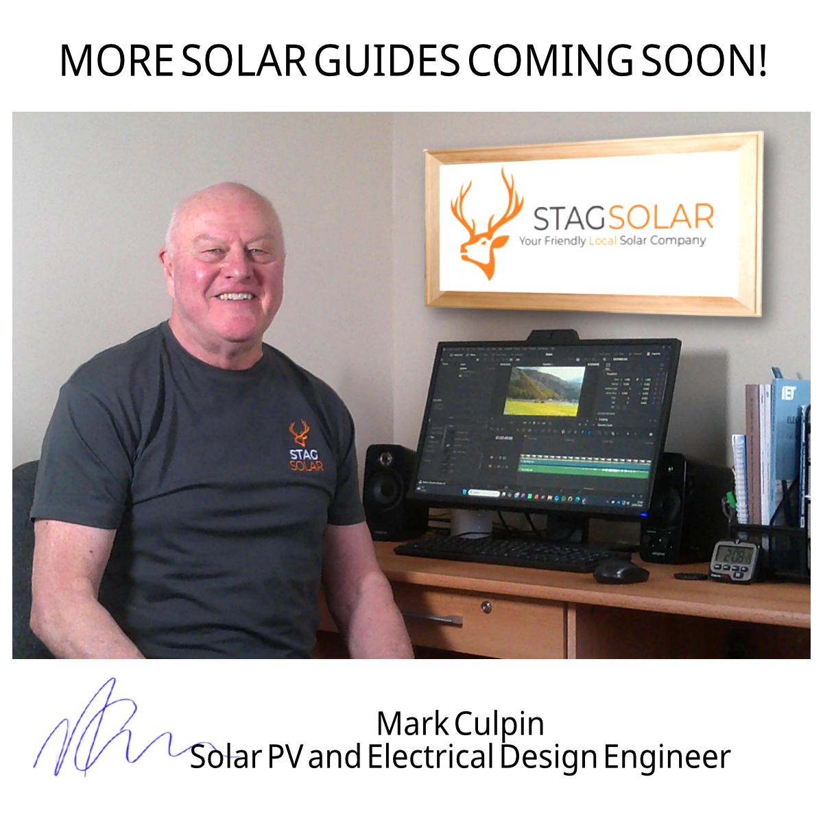 Solar Eexplainer Essex sitting at desk signing off a Solar PV blog post with handwritten signature.